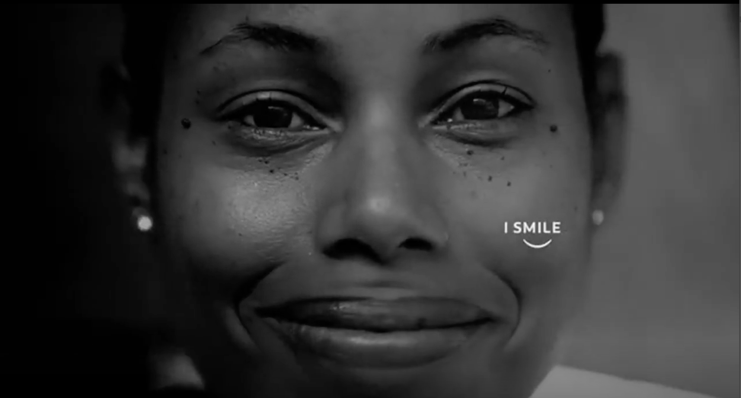 A woman’s smile in black and white