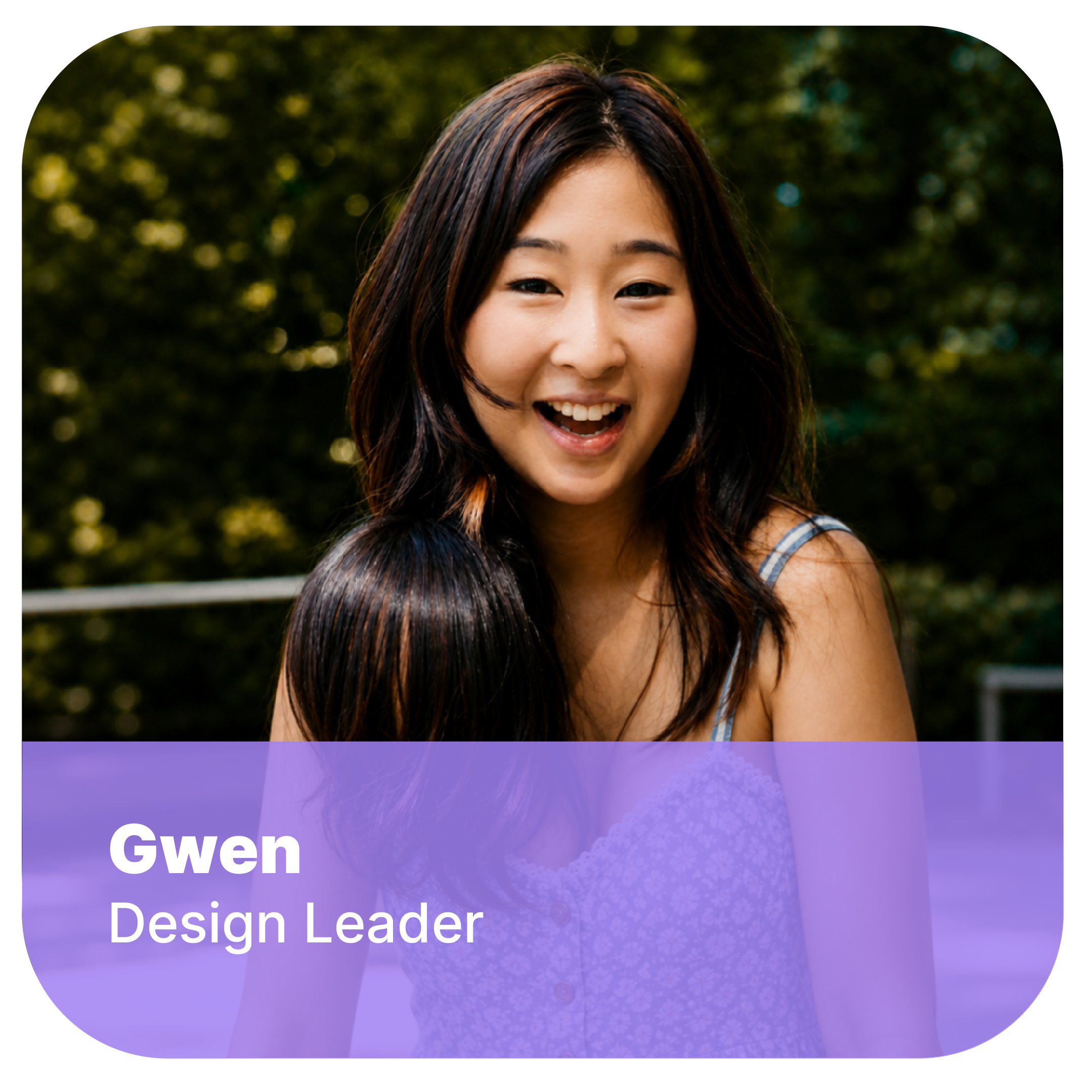 Close-up of a smiling woman with dark brown hair and bangs outdoors, with green blurred background; text overlay reads 'Gwen Design Leader'.