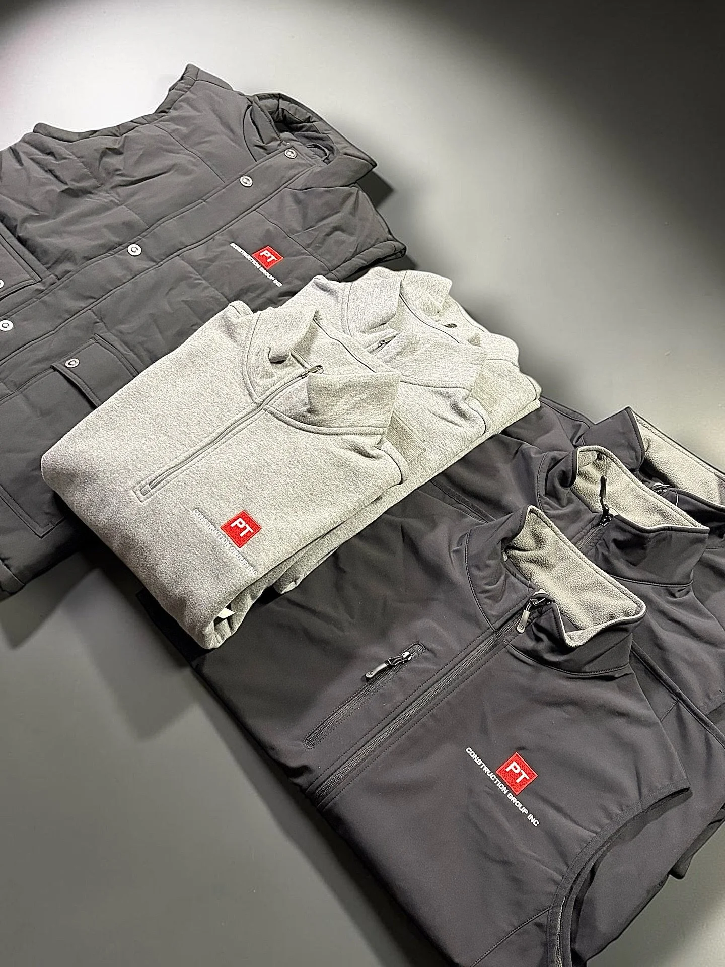 From blueprint to build site, custom gear embroidered to represent the team at @ptconstructiongroup