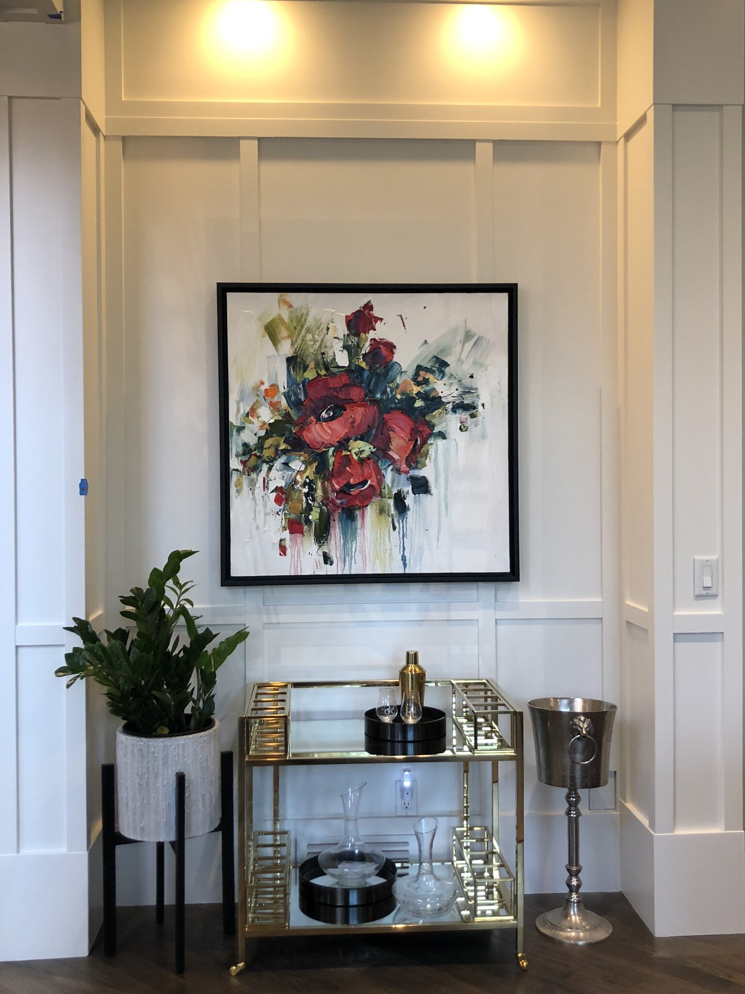 Elegant Bar Cart with Bold Floral Artwork and Panel Wall | Briar Hill I Renovation