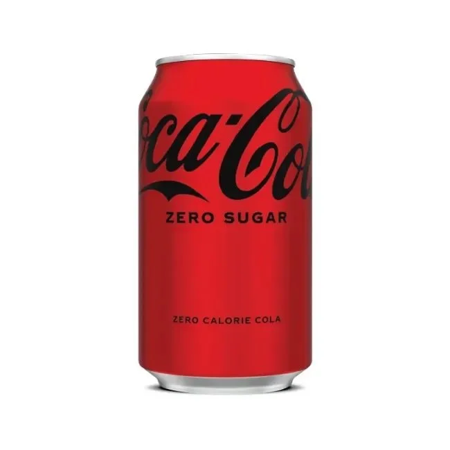  Two cans of Coke Zero. The first has a black can that says Coca Cola Zero, real Coca-Cola Taste and Zero Calories. The second is the more recent branding  – a red can with black Coca Cola signature branding that says "Coca-Cola Zero Sugar, Zero Calo