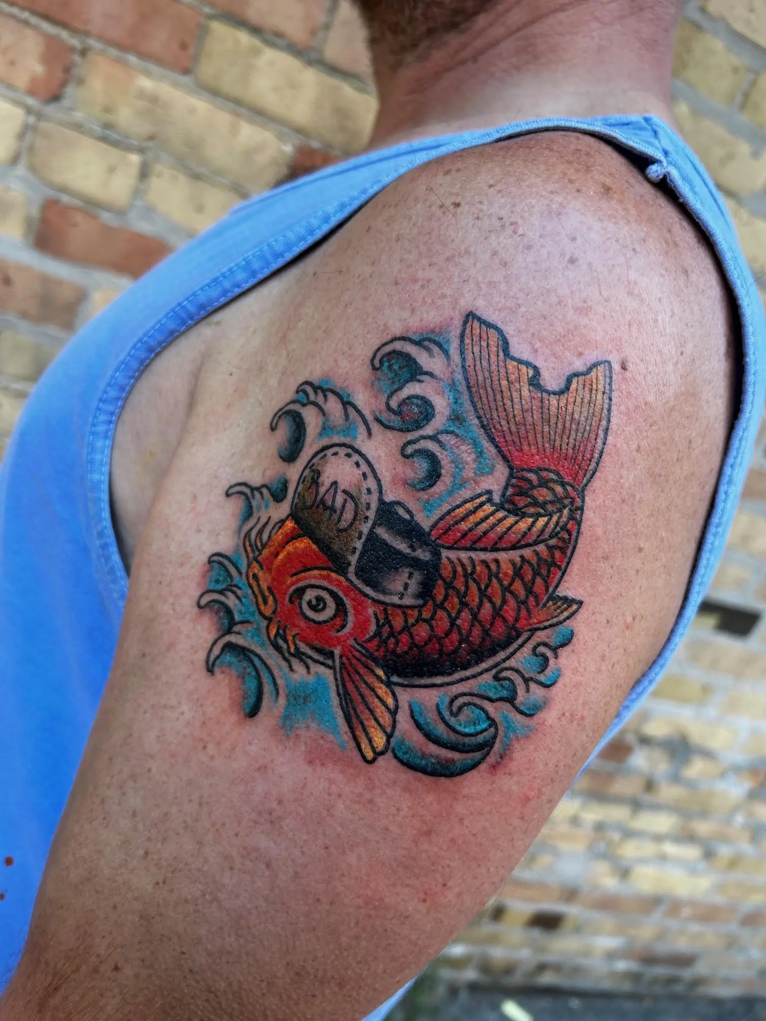 koi fish hat tattoo.jpeg
