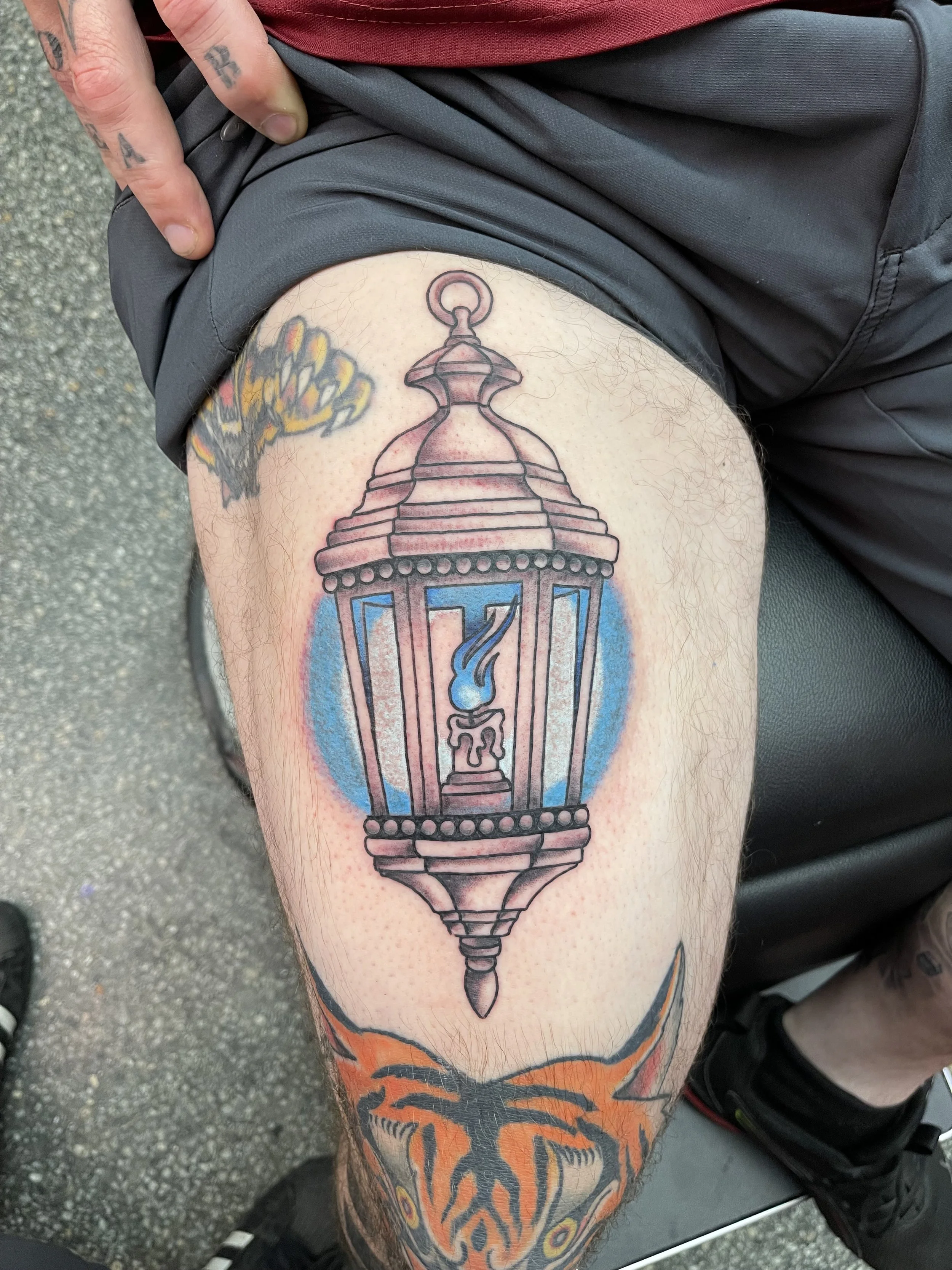 lantern fine line tattoo.jpeg