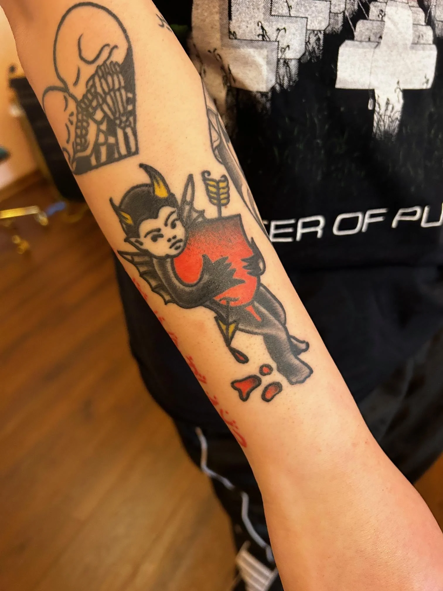 devilish heart tattoo.jpeg