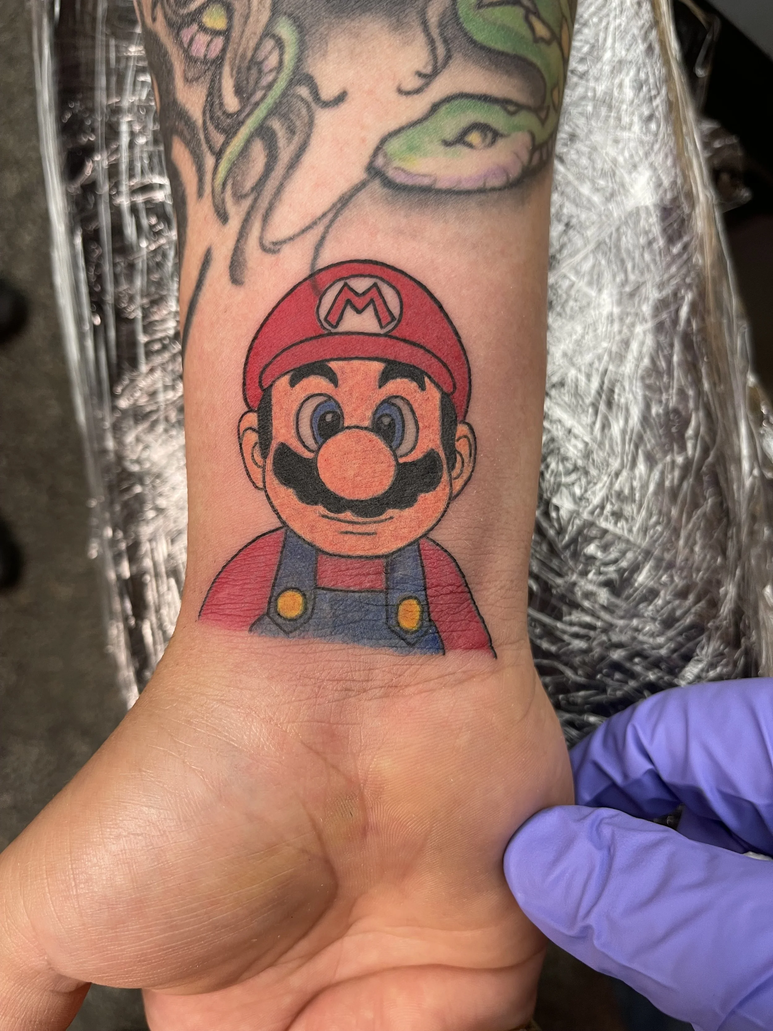 mario bros tattoo.jpeg