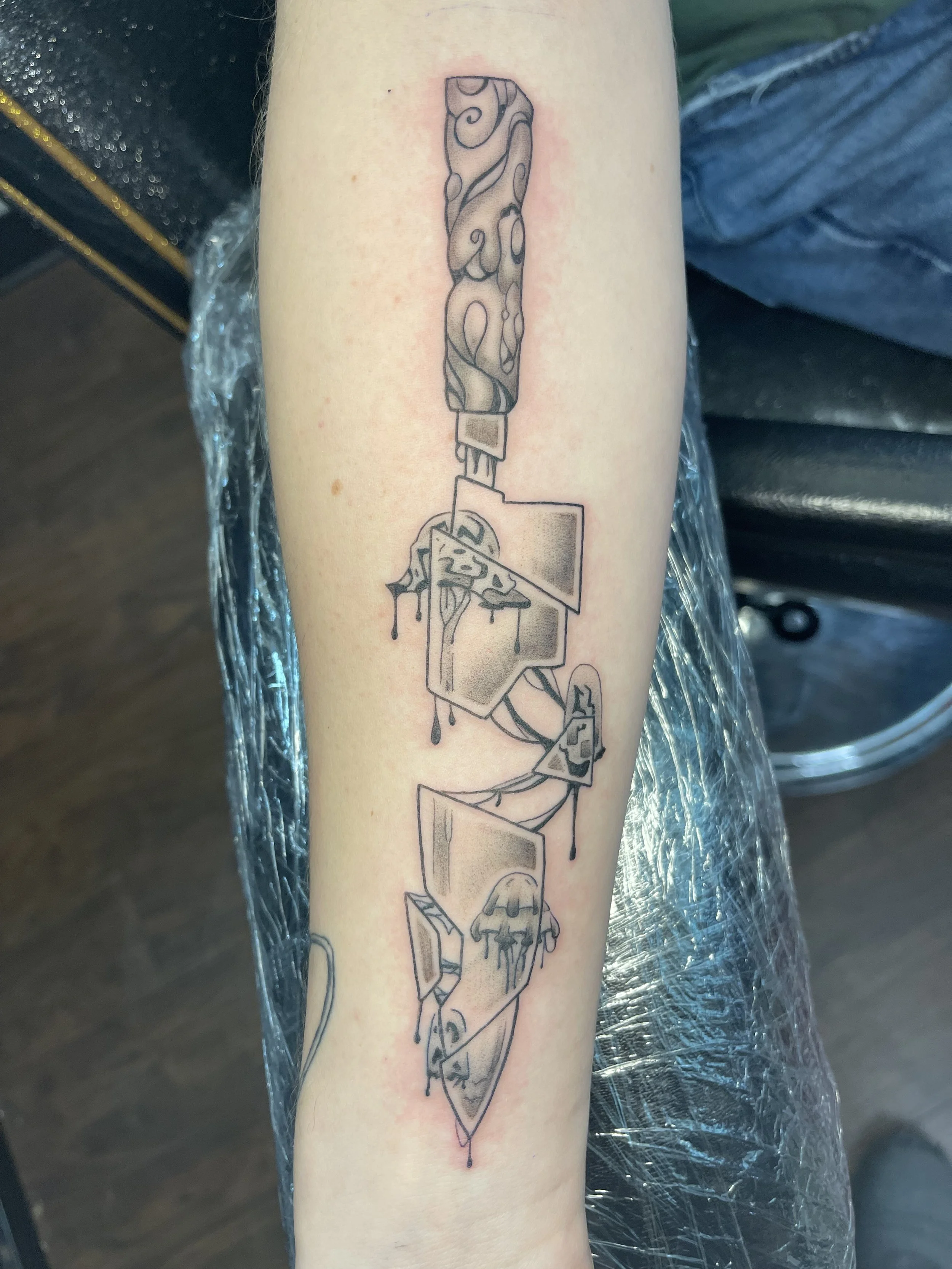 broken knife tattoo.jpeg