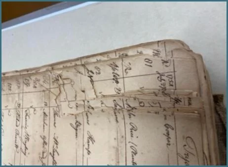 The document showed successive breakage along the Iron Gall ink lines. Not pictured
are the carefully set aside groups of like-shaped fragments, still in order when nested.