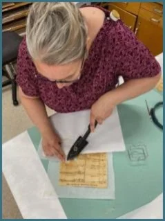 Using bespoke in-house heat set tissue (HST) to stabilize the page.