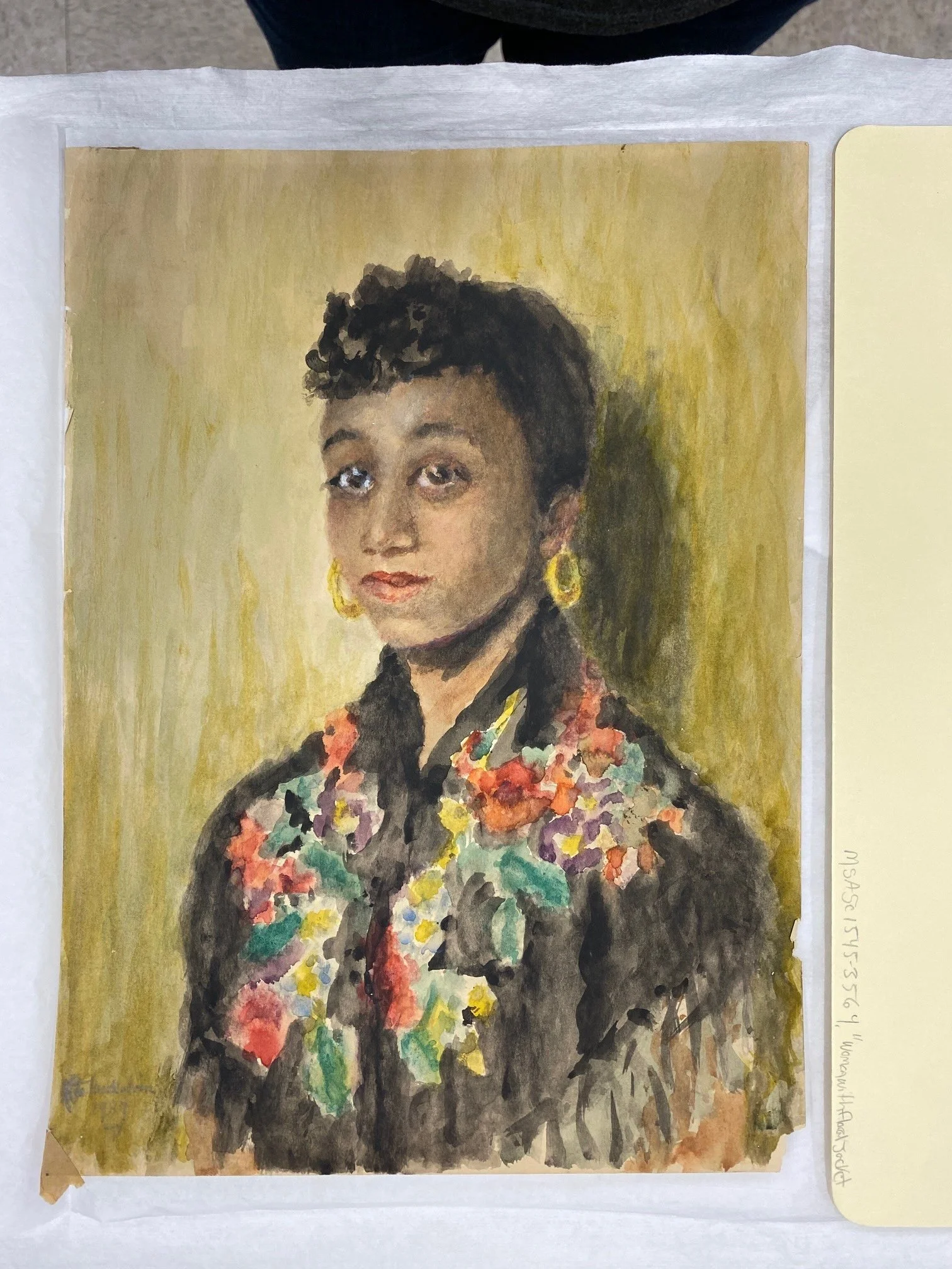 Before treatment. Extensive damage to the lower-right edge. Loss of that lower-right corner. Lower-left corner presents previous paper mending with incompatible material.