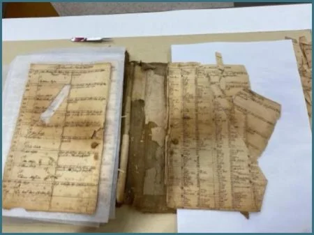 Separating the page layers, which were stuck folded and broken together. The most
damaged sections seemed to be at the front and back of the book. I decided to proceed with the rest of the book, in order.