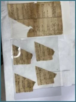 Broken sections organized and encased in Mylar to reintegrate later.