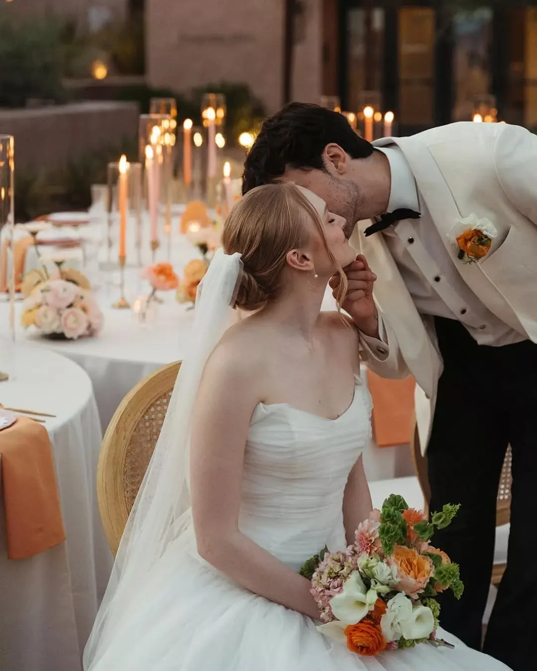 We&rsquo;re still obsessed with the serpentine curves from this recent shoot. There&rsquo;s something so beautiful about pairing bold, citrusy pops of orange and coral with the soft, ethereal drape of linen. The candlelight adds that final, perfectin