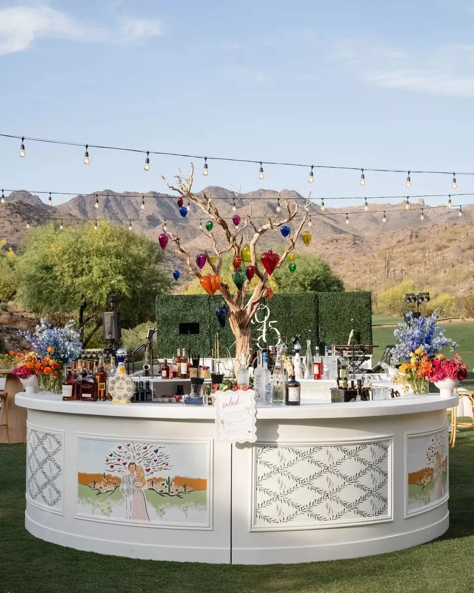 Most bars back up to a wall and call it a day. A round bar doesn't have that option - and that's exactly the point.

When a bar lives in the middle of the room, it becomes part of the flow. Guests move around it, gather at it, find each other because