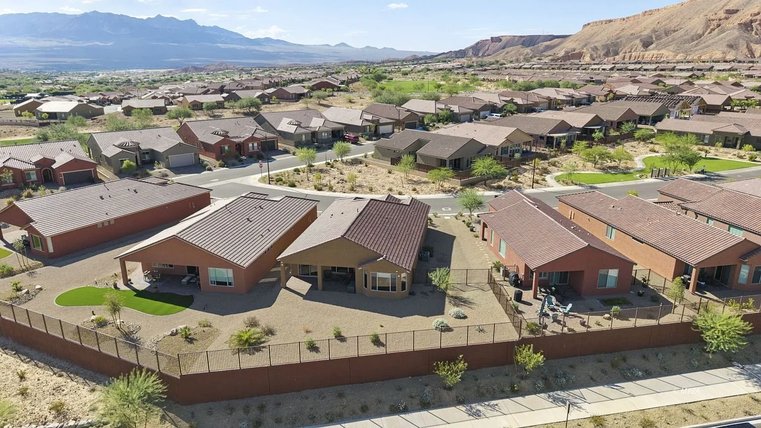 Aerial view of a Mesquite, Nevada neighborhood with mountains in the background