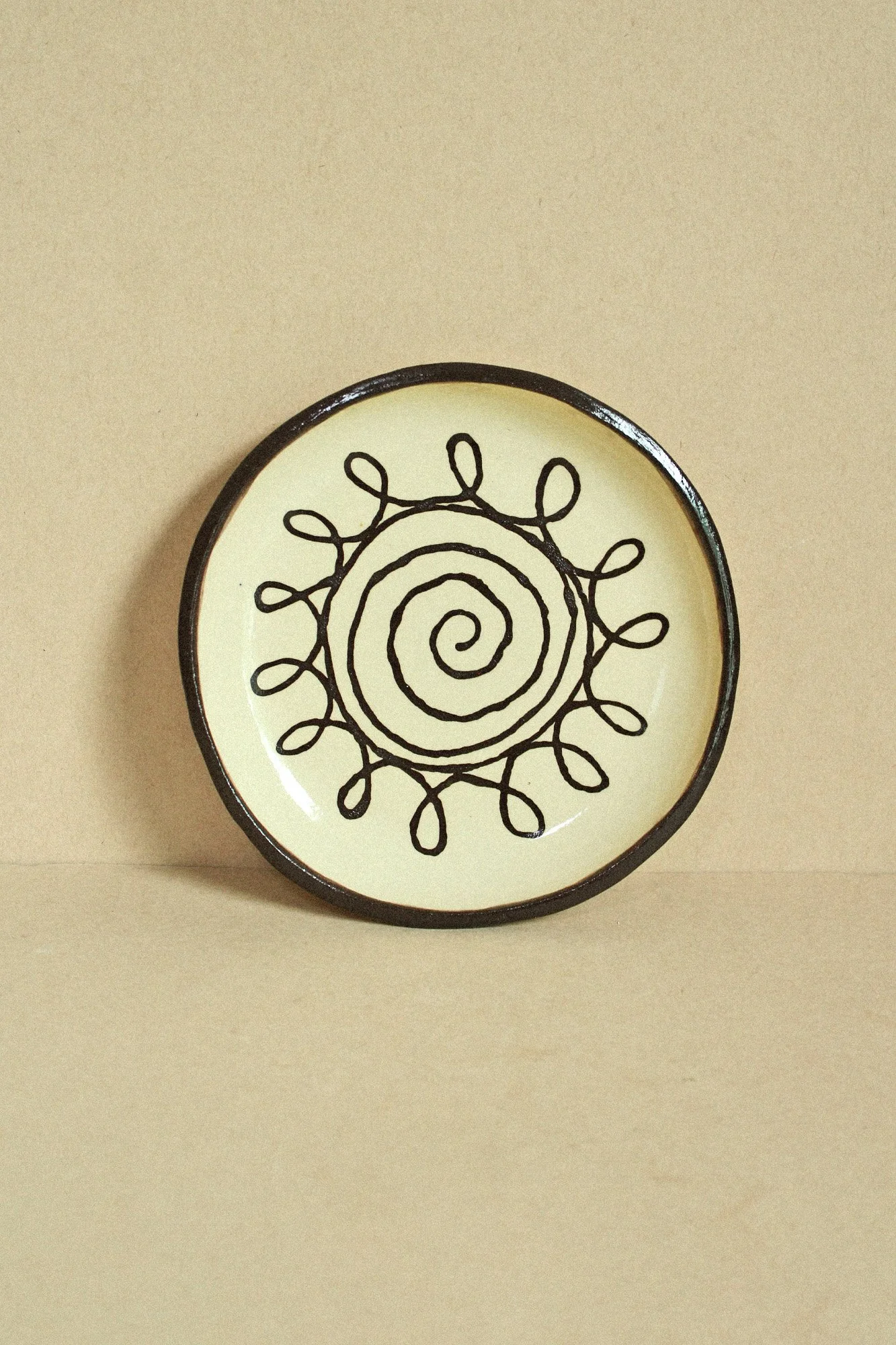 spiral-sun-plate-espresso-1.jpg