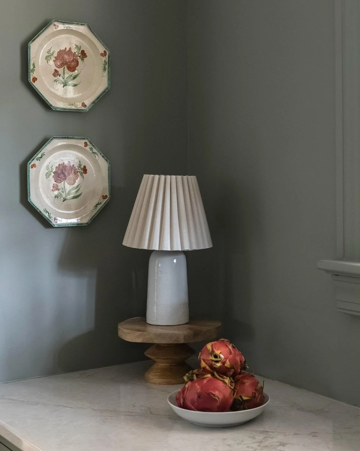 It&rsquo;s all about the details 🤍 I sourced these gorgeous plates for a client in France last year and love seeing them hung in this happy kitchen!