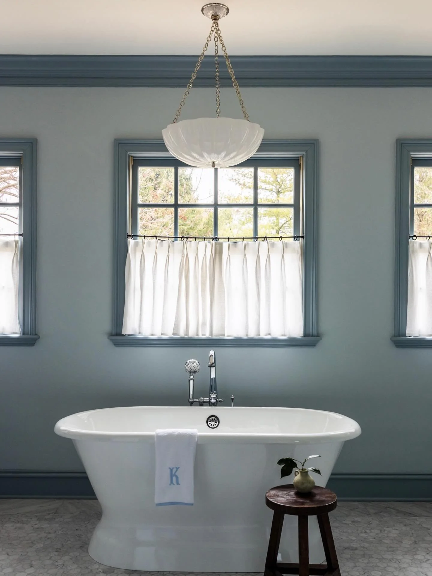 Splish splash 🛁! This color blue turned out equal parts gorgeous and peaceful &mdash; just the way a bathroom should be.