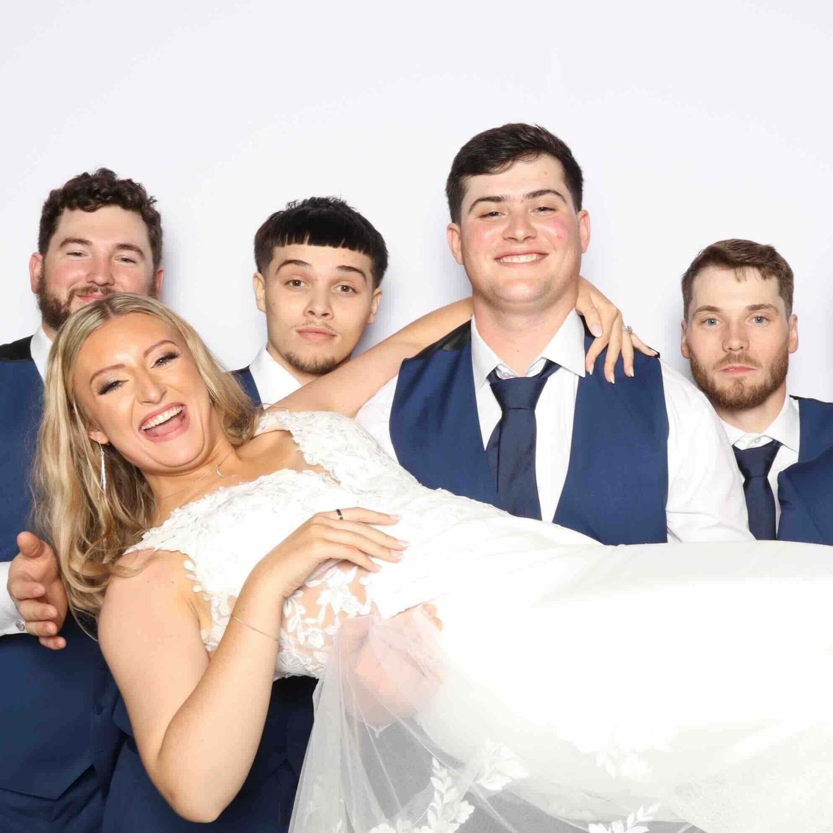 Optimized+Wedding+Events+Bride+Held+by+Goomsmen.jpg