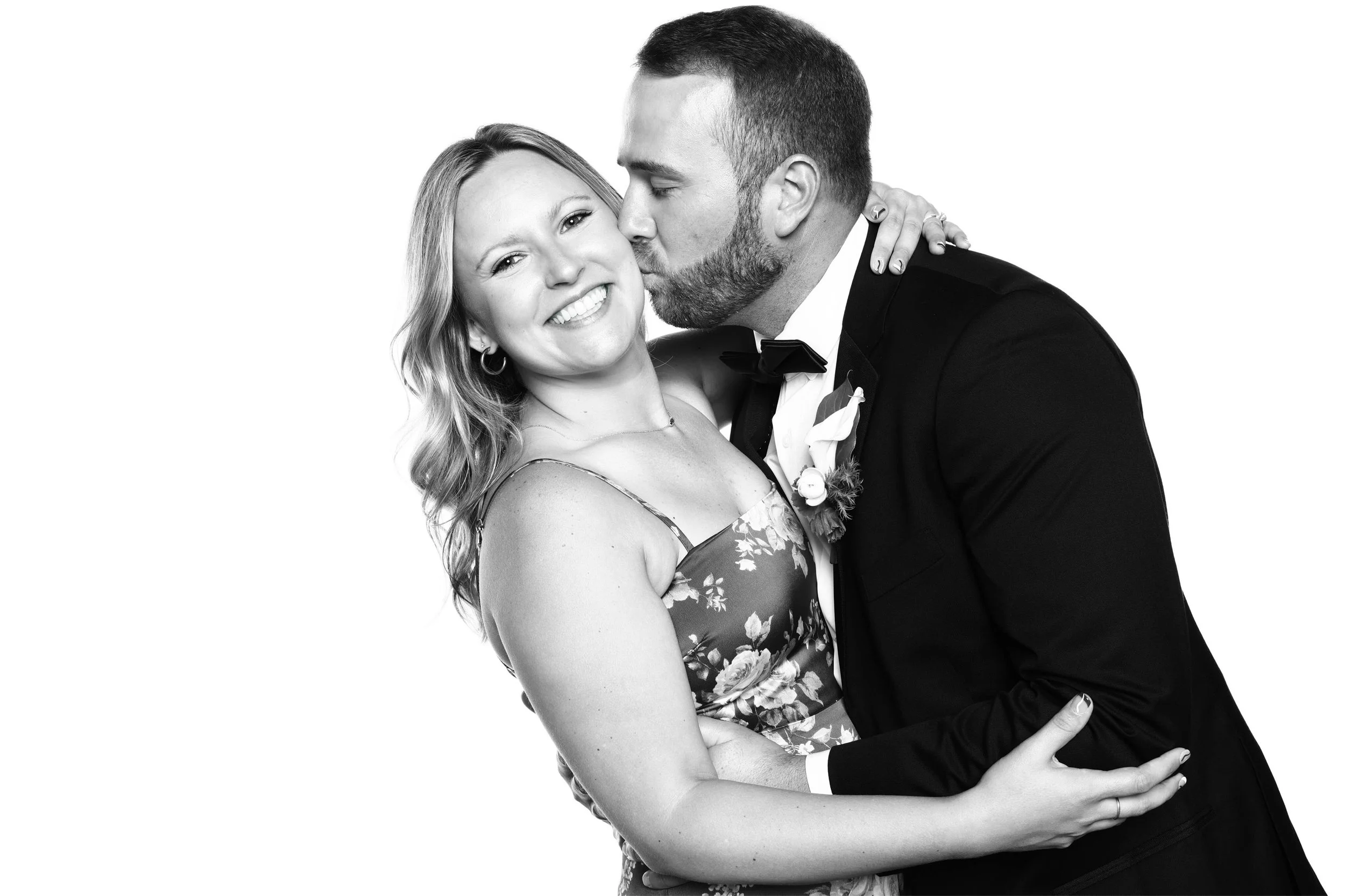 Optimized Glam Studio Man Kissing Girl on Cheek.jpg