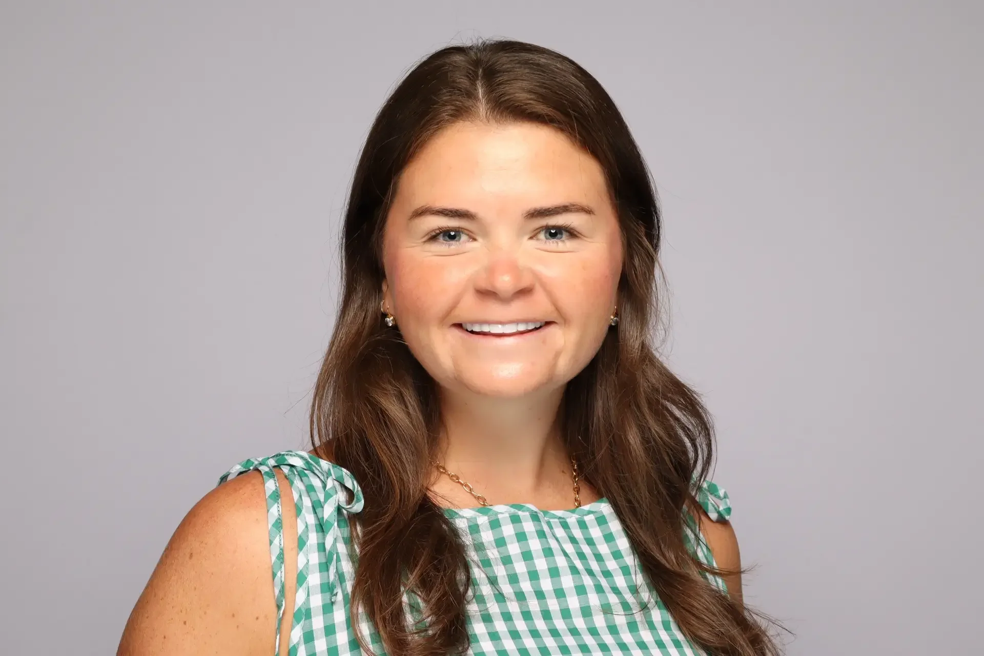memphis ALSAC headshot corporate event woman in green check