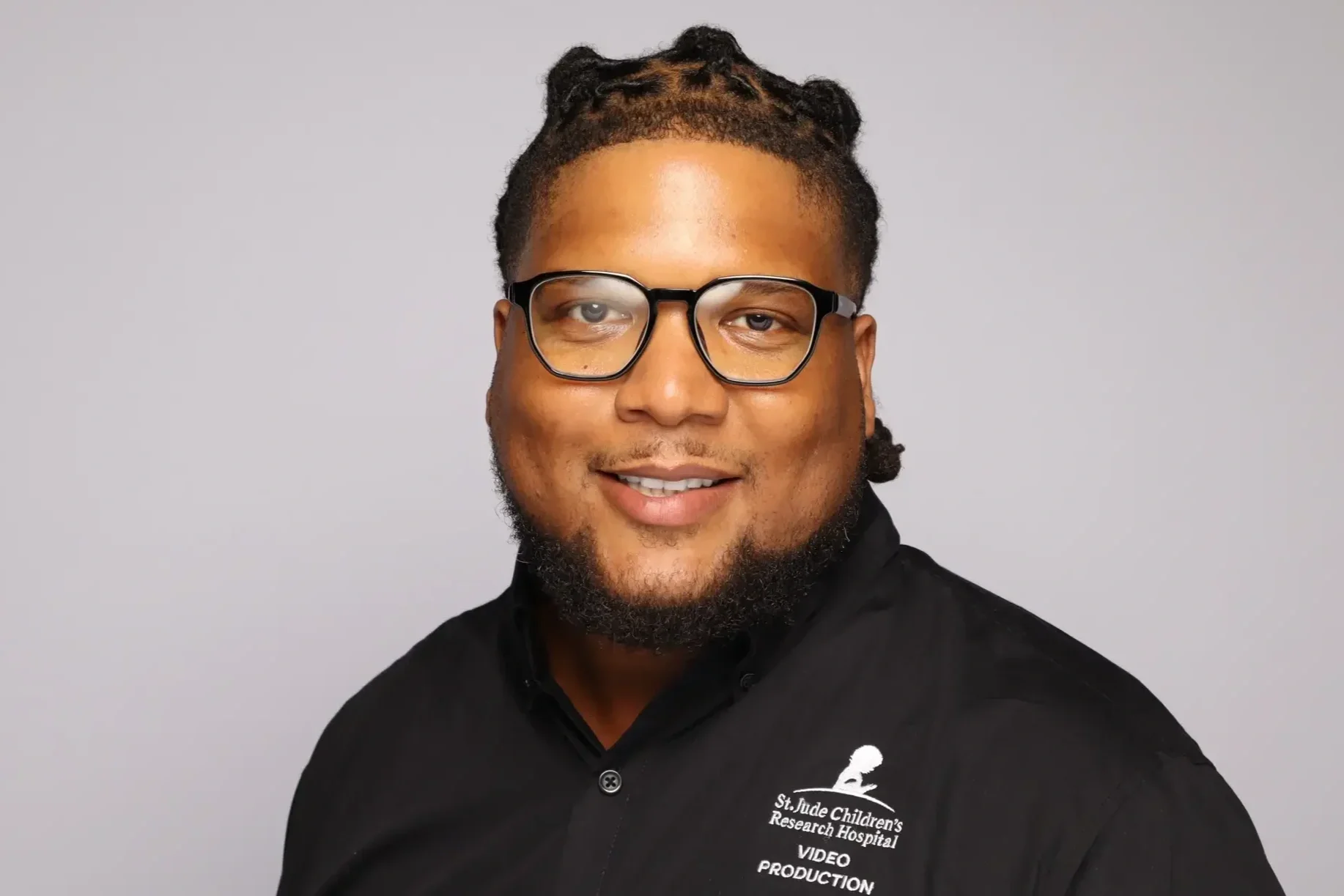 memphis ALSAC headshot corporate event man in black polo