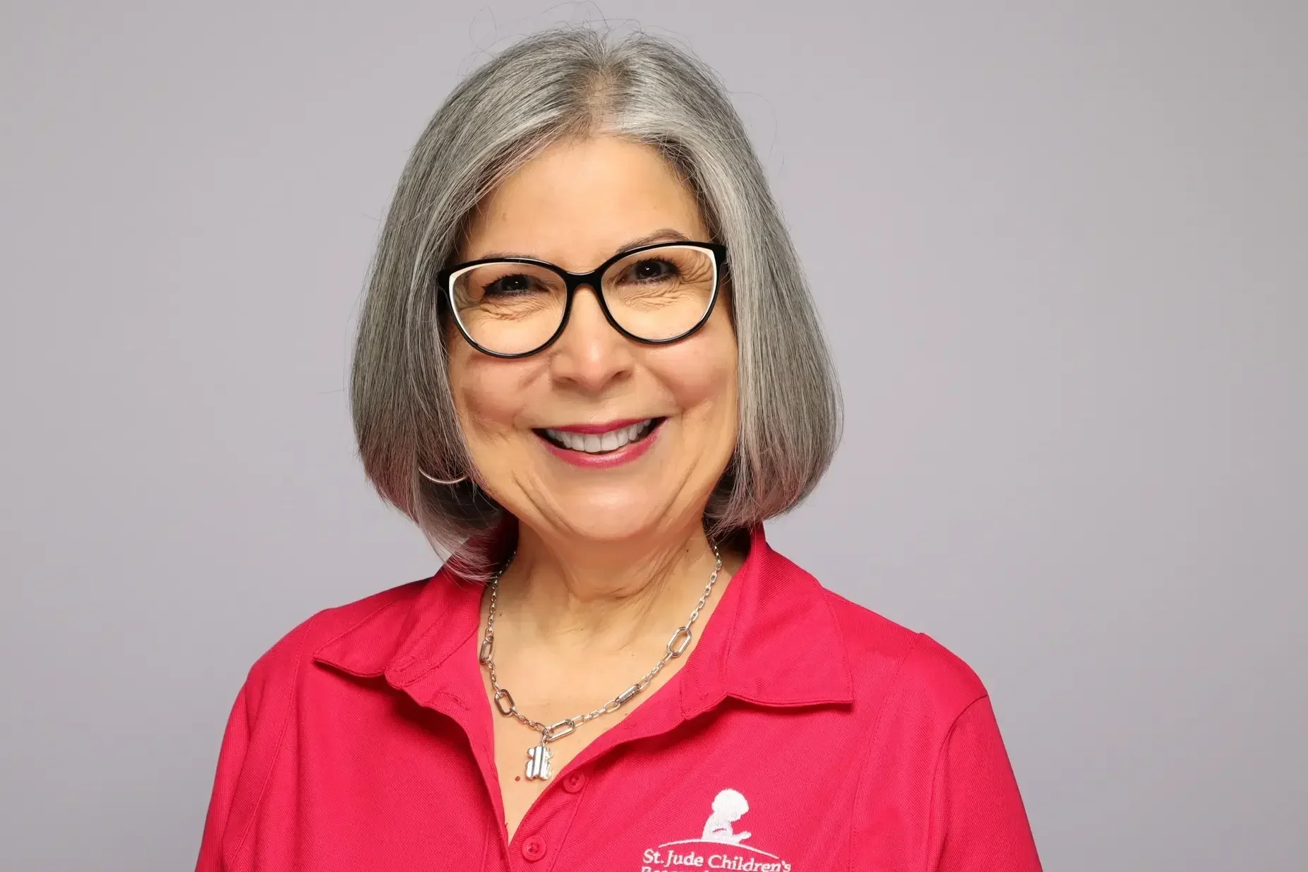 memphis ALSAC headshot corporate event woman in pink polo