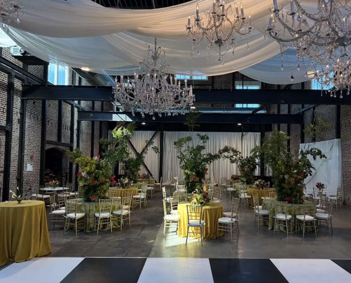  Photo of a wedding at The Kent with florals by John Mark Enterprises, planned by Salt Memphis 