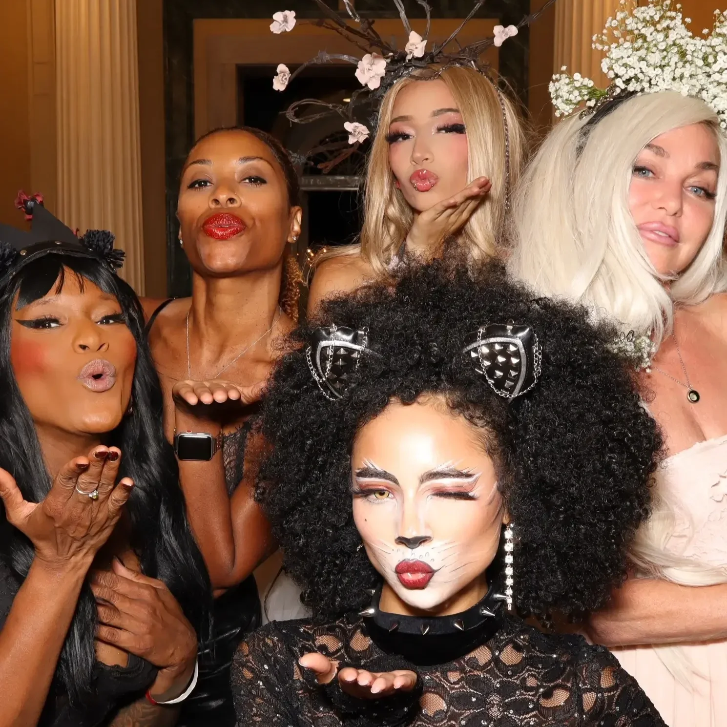 Models blow kiss to the Selfie Booth at Memphis Art Museum Come As Thou Art