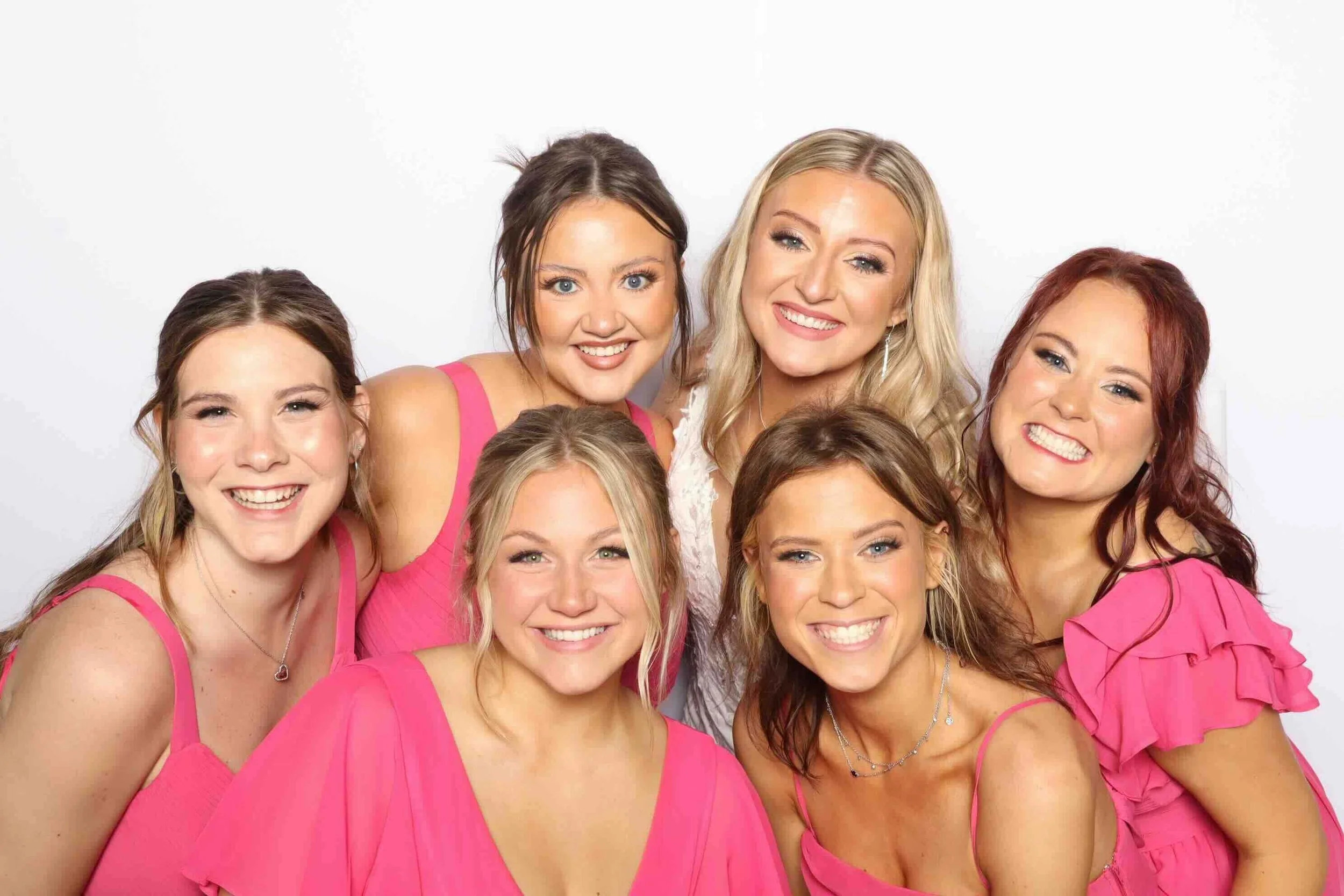 Bridesmaids having fun with Bride in photo booth in Memphis