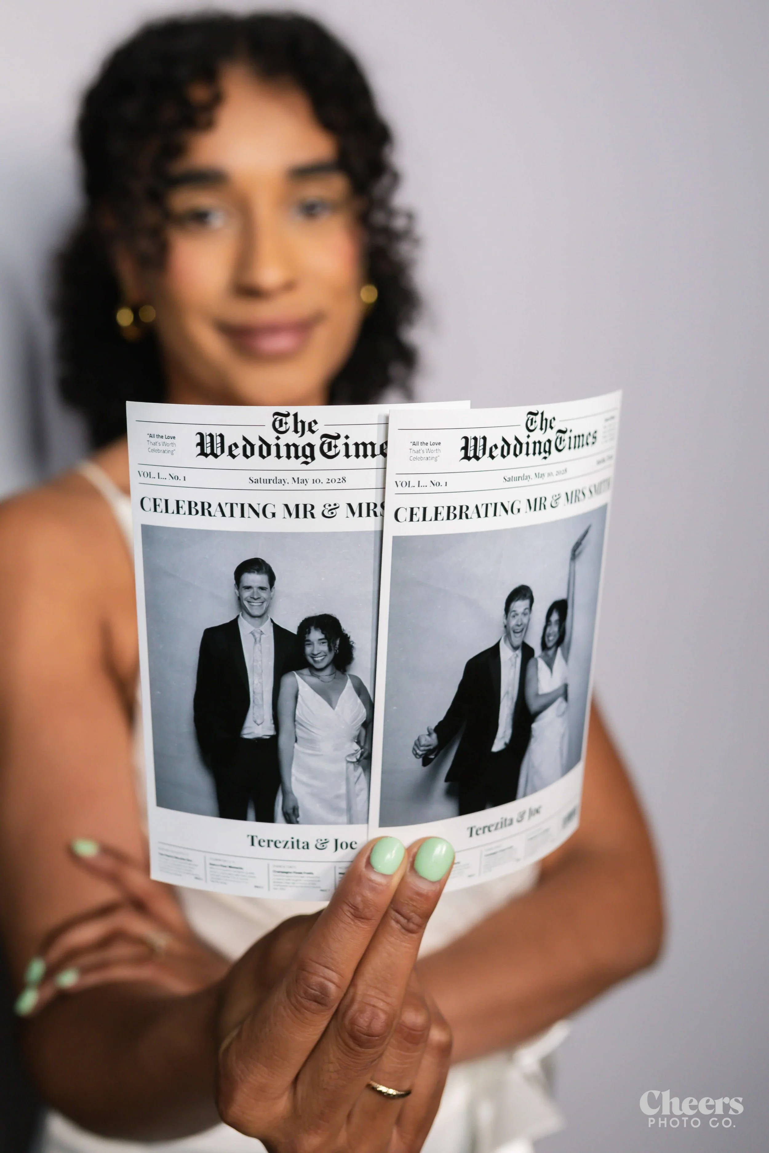 Optimized Newspaper Booth Guest Holidng Prints.jpg