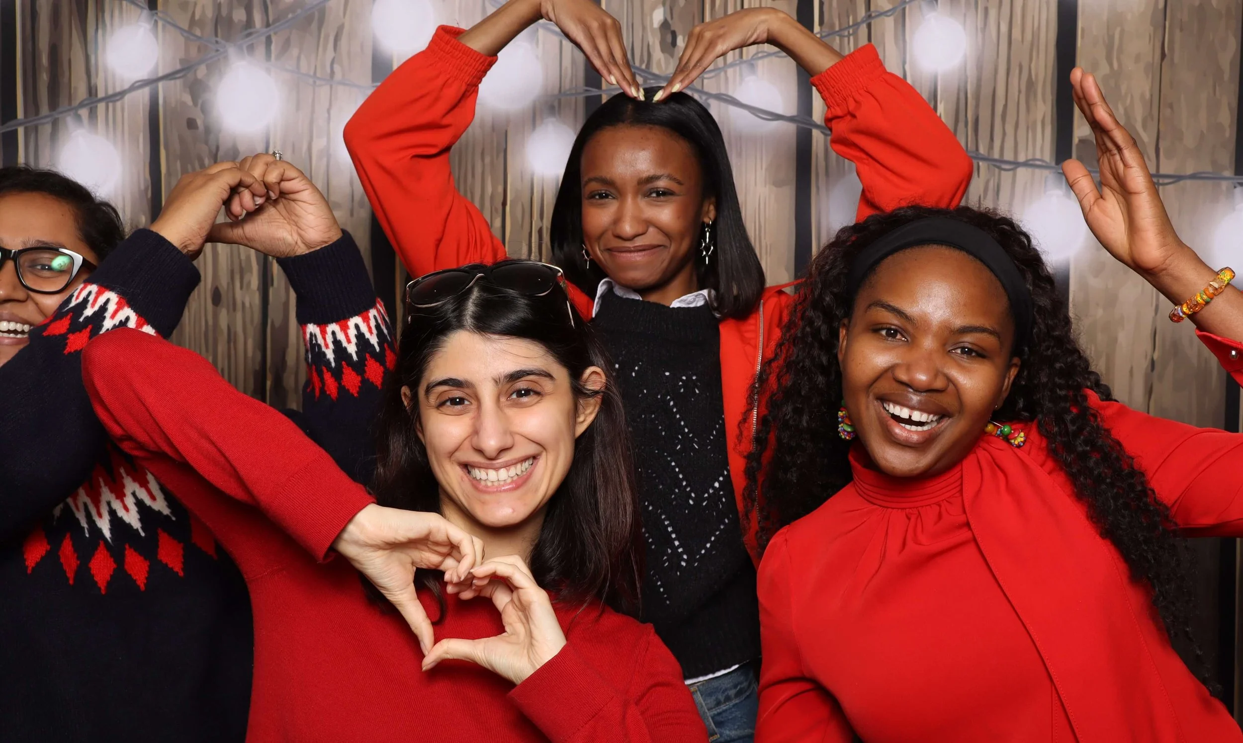 Holiday Photo Booth Memphis Team Making Hearts
