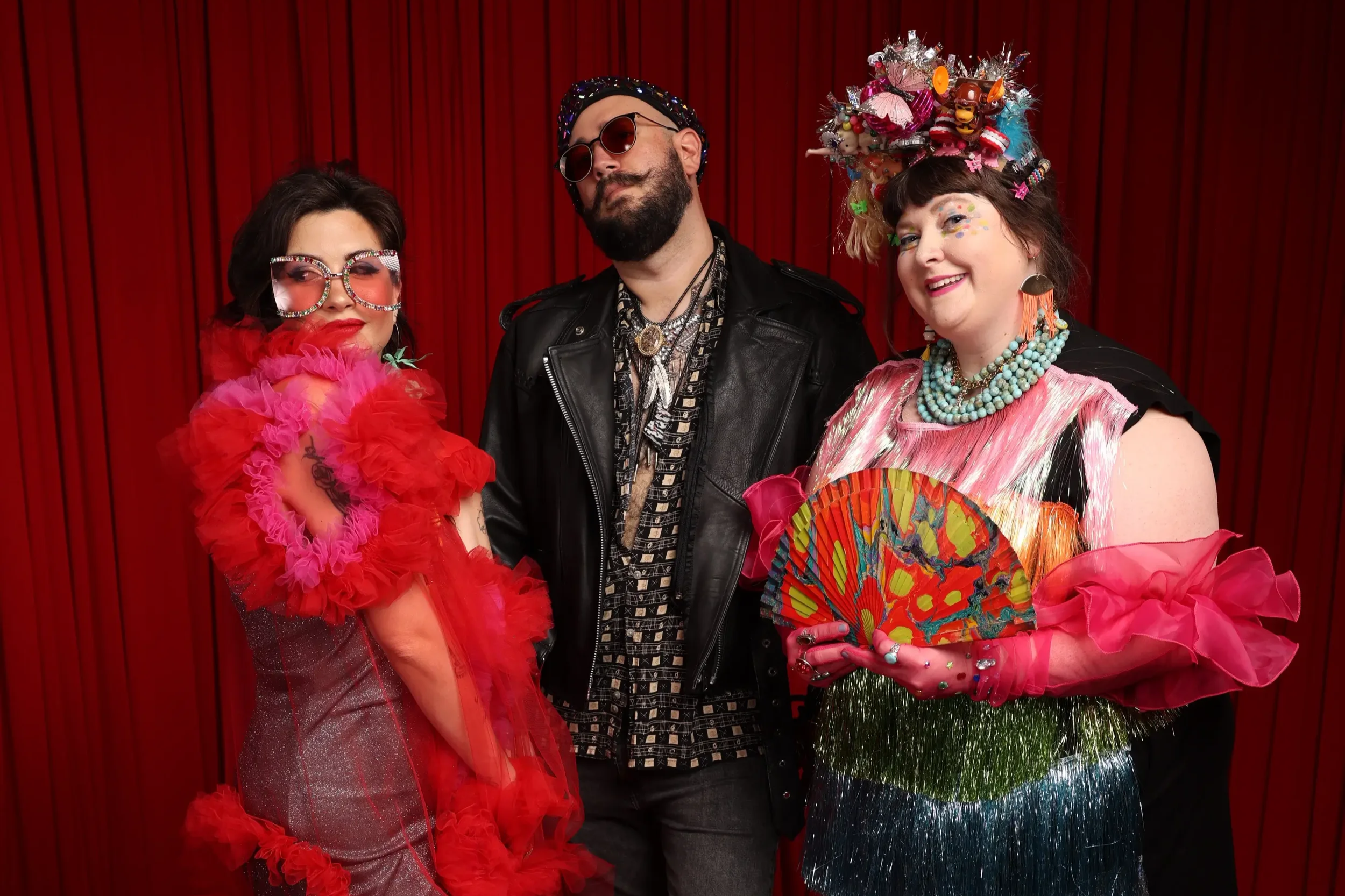 friends pose in red carpet photo studio in Memphis