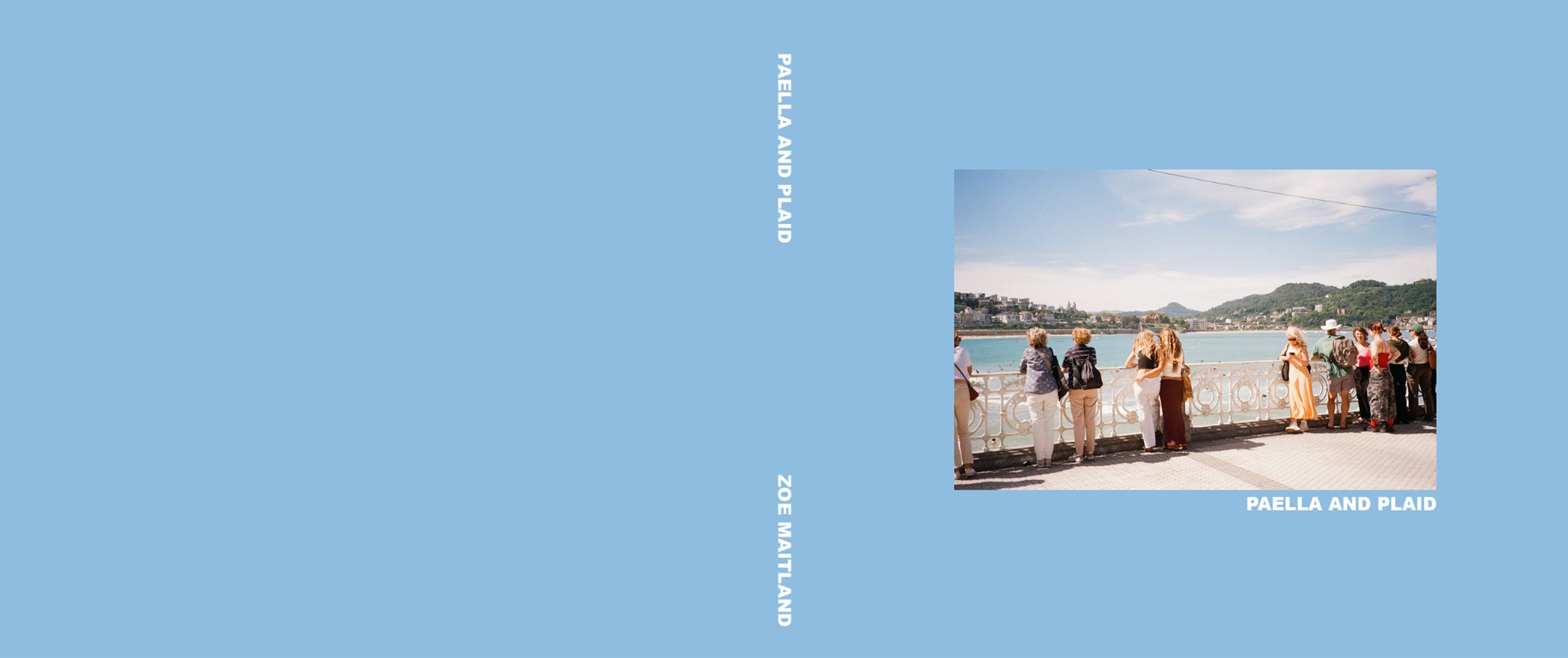 Cover of a book titled 'Paella and Plaid' by Zoe Maitland, featuring a photograph of tourists on a bridge overlooking a body of water with mountains in the background, under a partly cloudy sky.