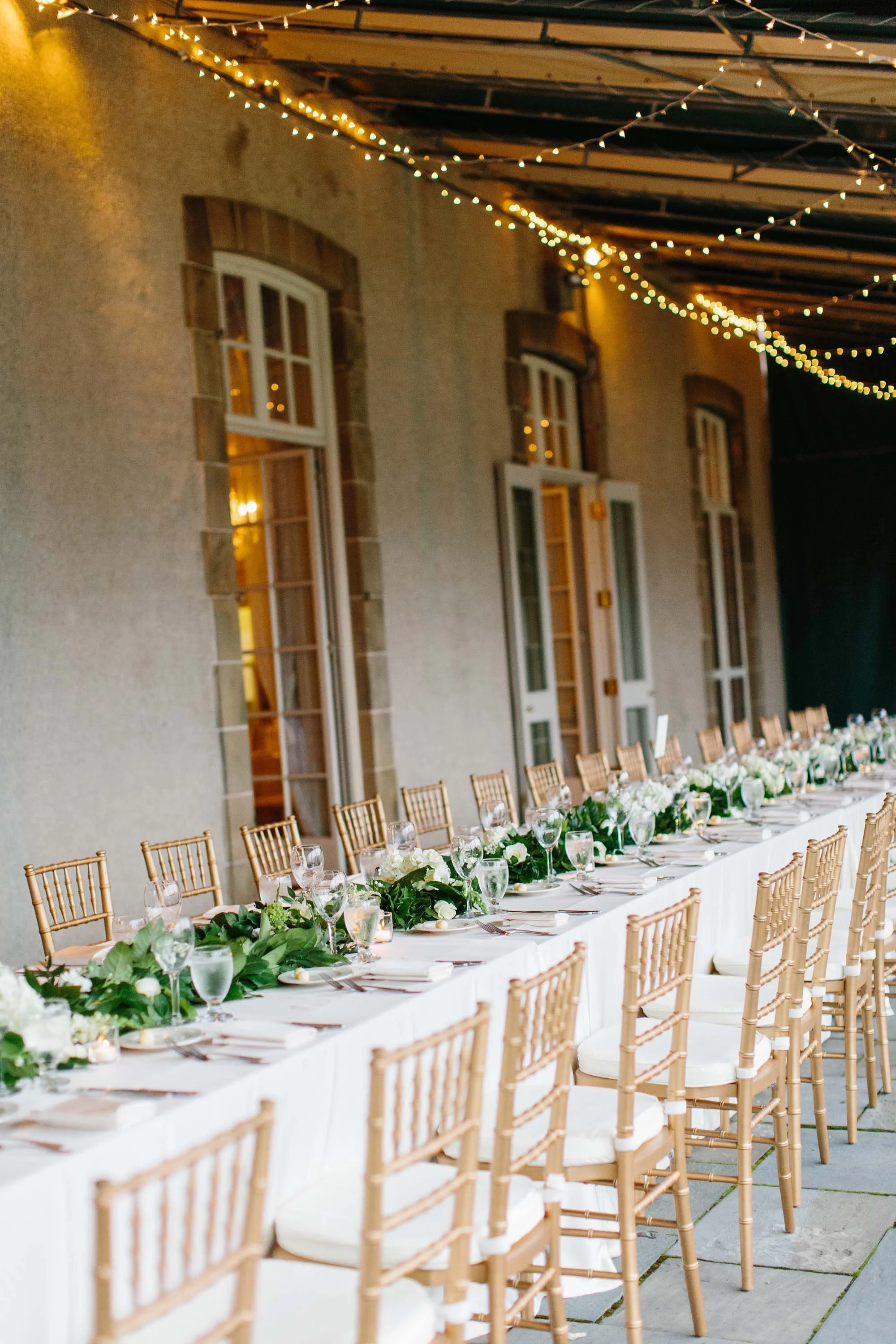 Romantic reception table under fairy lights