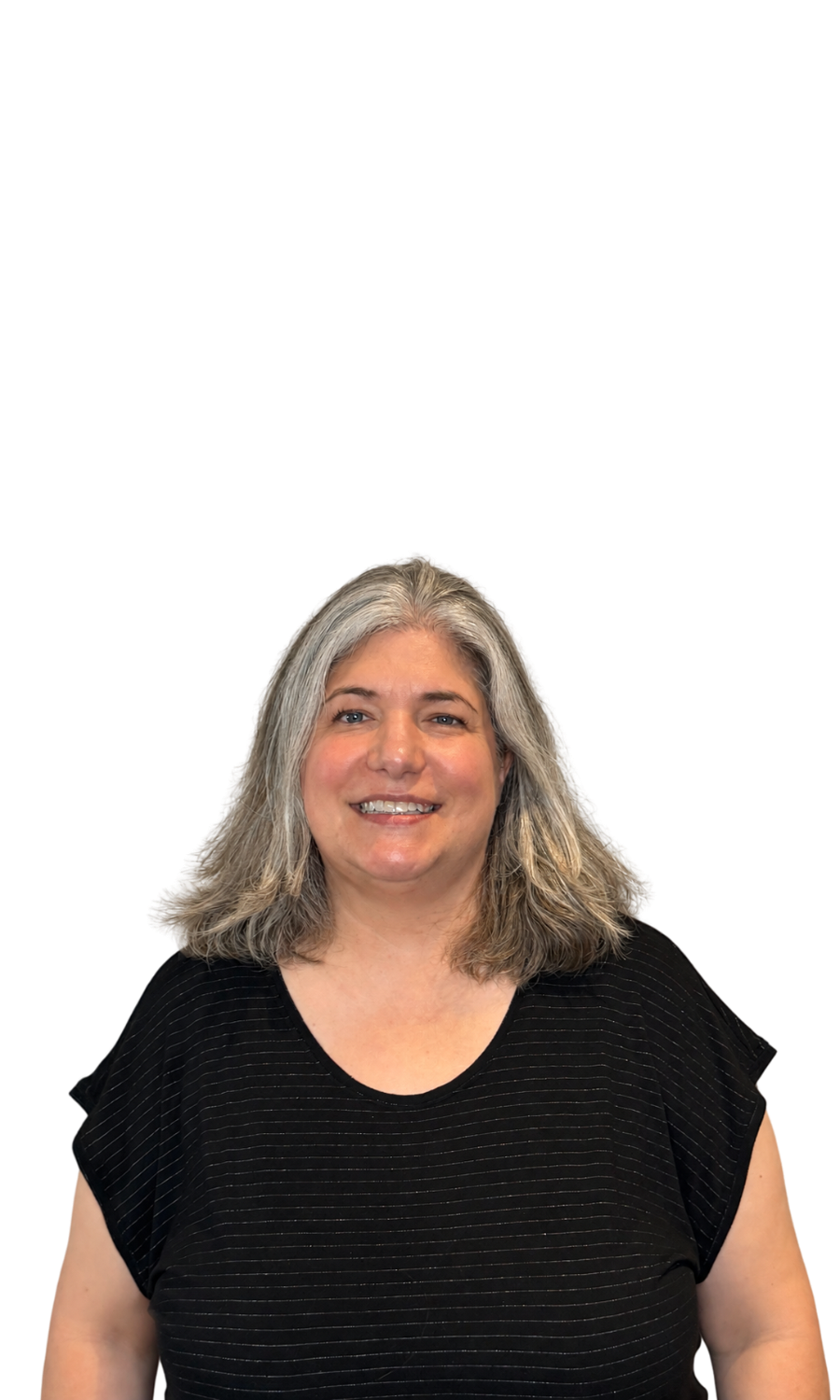 A smiling woman with gray hair wearing a black shirt with thin white lines.