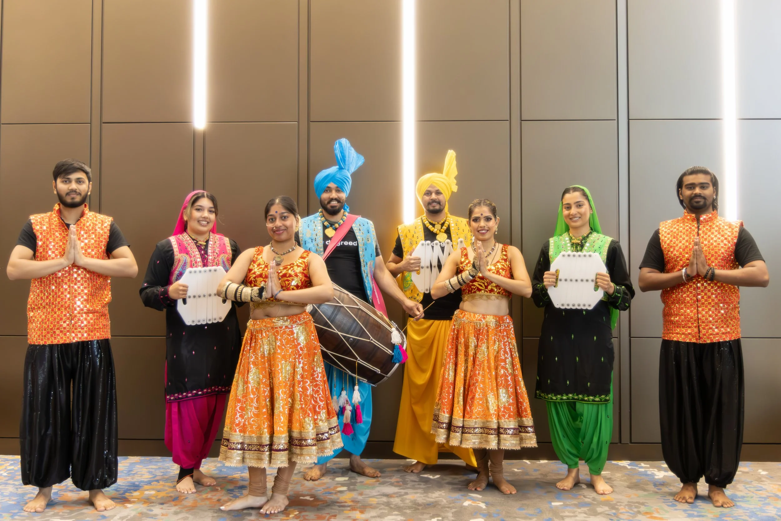 Dance N Beats crew and Ultimate Bhangra standing alongside together. 