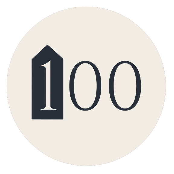 Number 100 printed on a circular badge or sign.