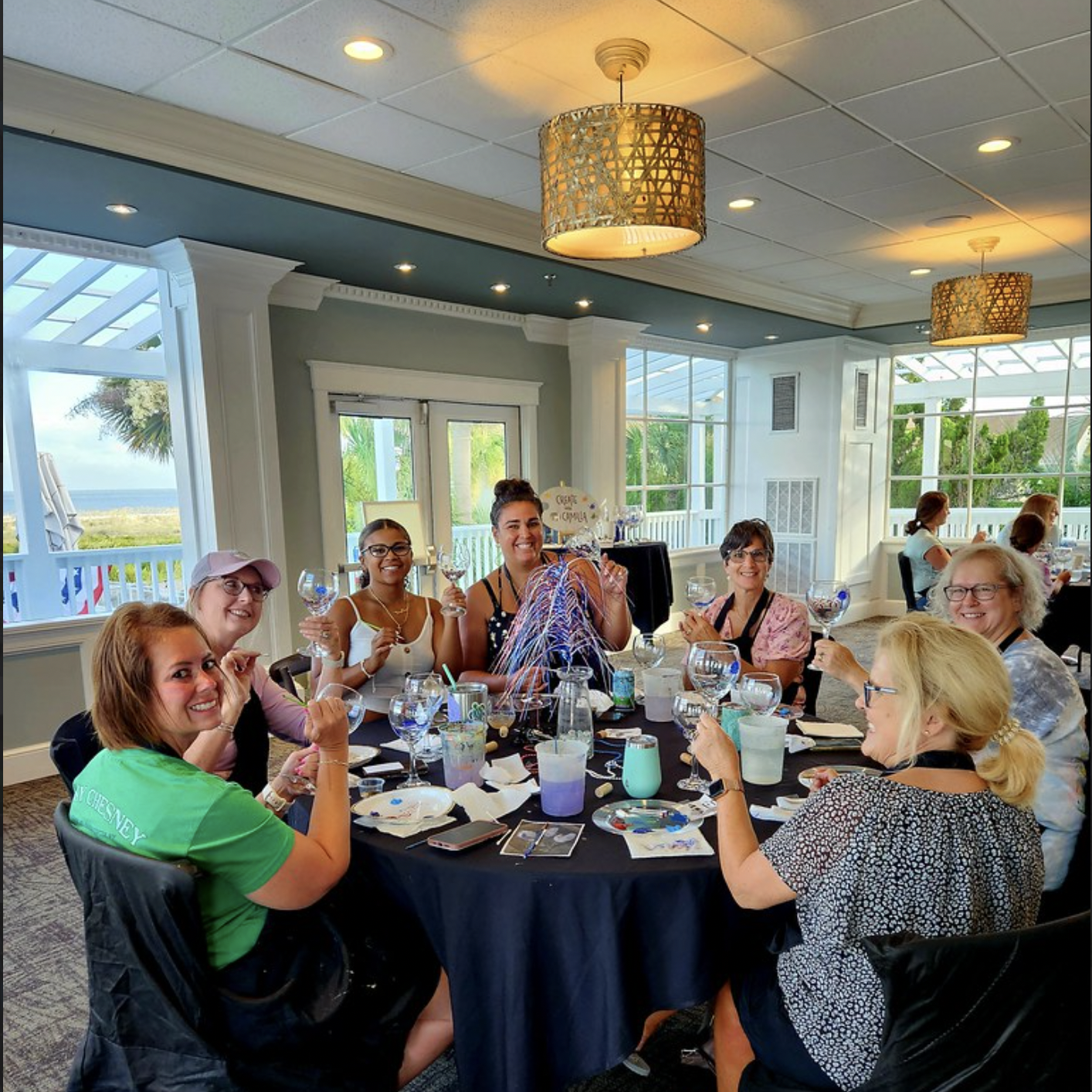 A group enjoying a creative team experience together