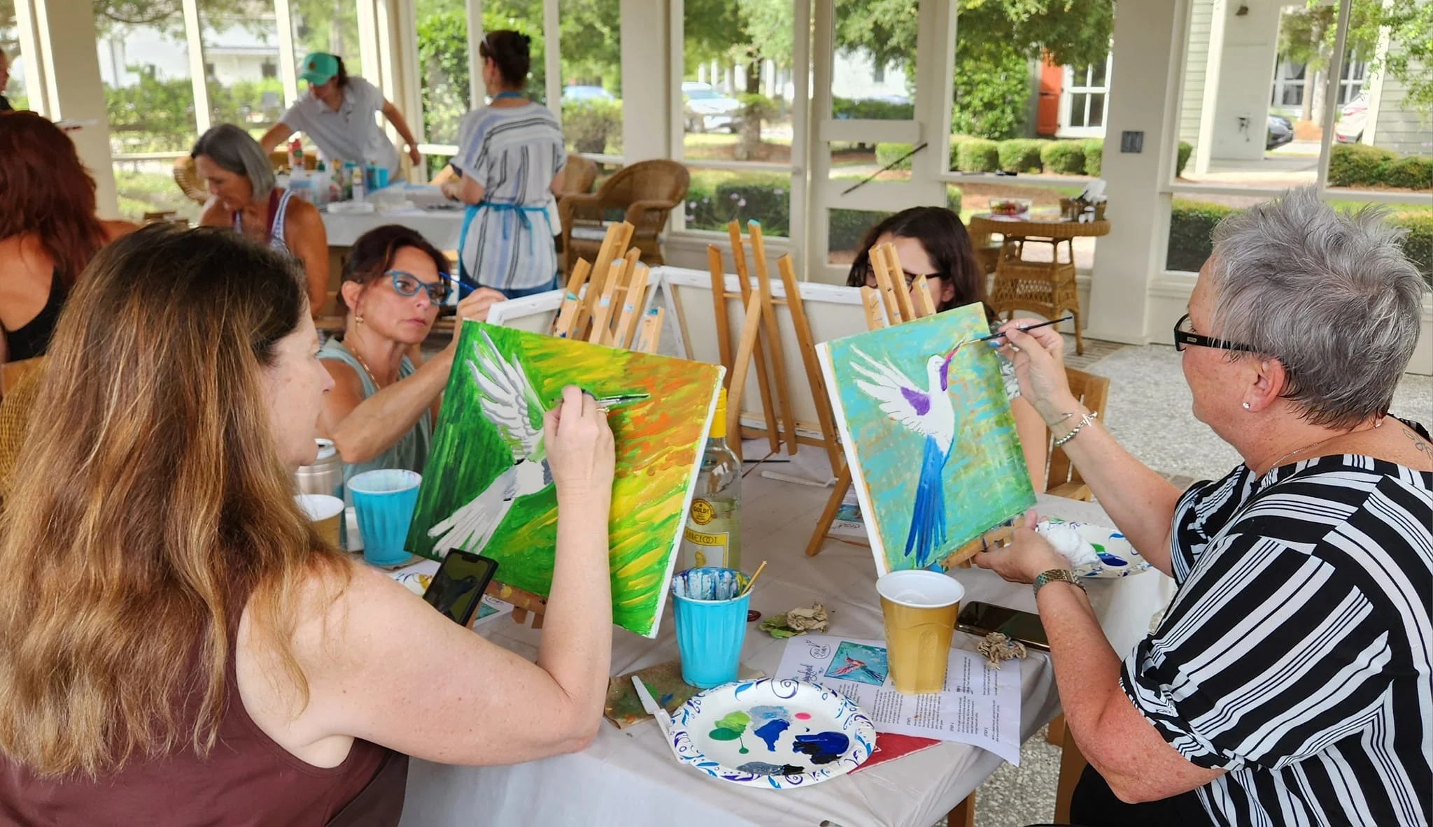 Guests enjoying a group painting experience