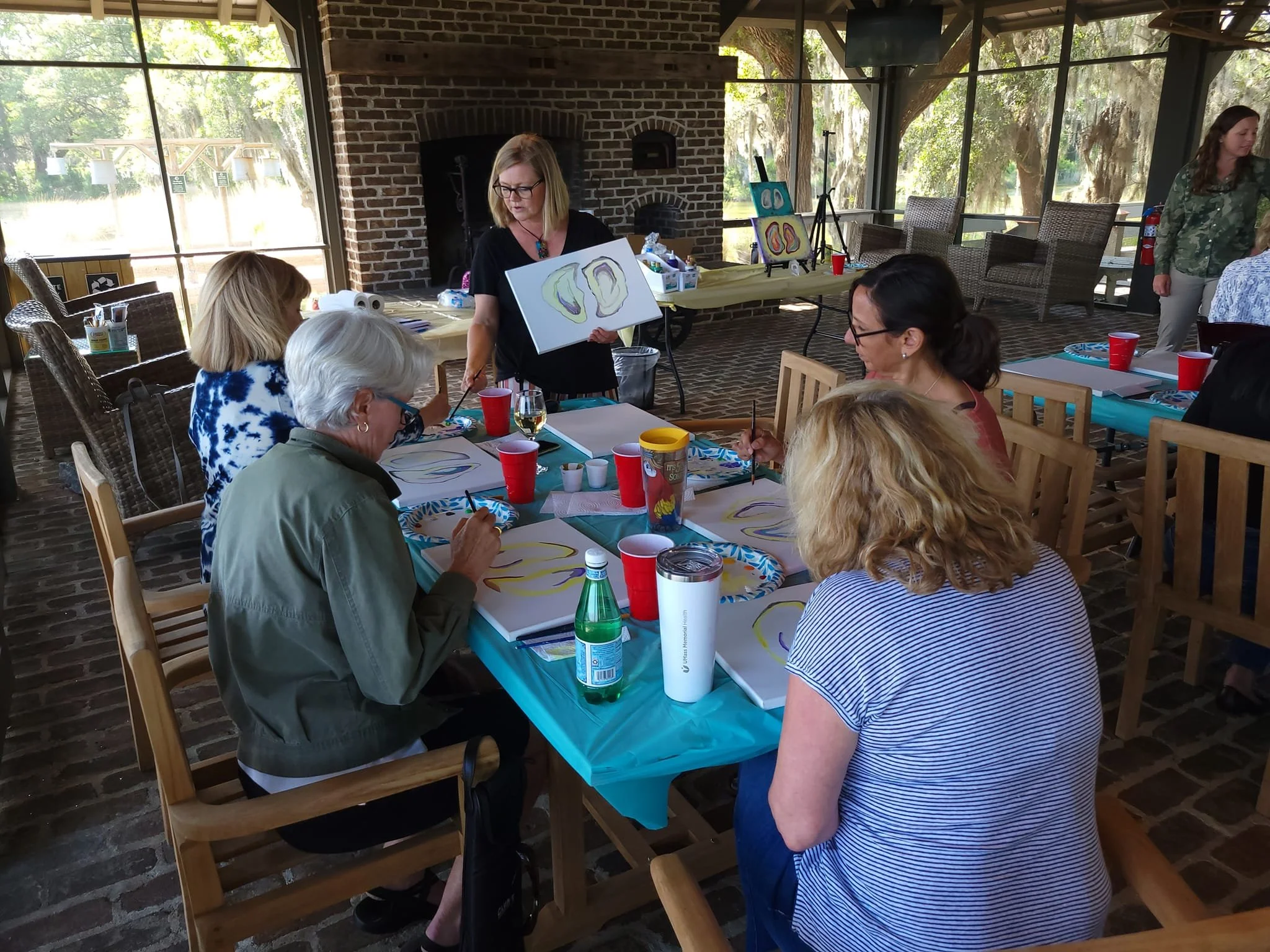 Camilla guiding a creative group experience