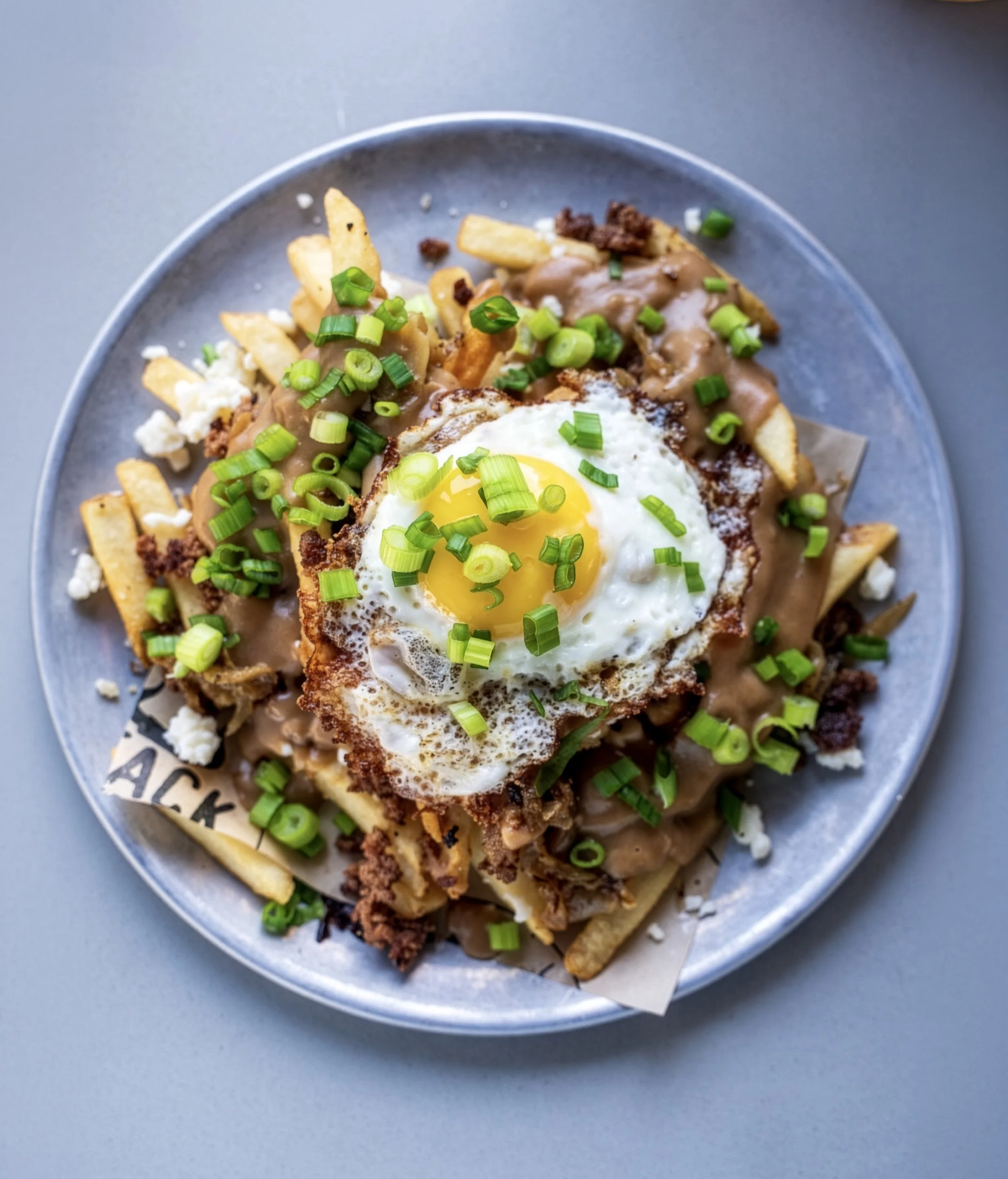 Our Loco Moco Fries, caught in their natural habitat. 🍟 Crispy. Loaded. Gravy-drenched perfection.

Big thanks to @shopmvvillage for this beautiful shot. 😍

.
.
.

#RivertonUtah #slcfoodie #saltlakecity #utahfood #slc