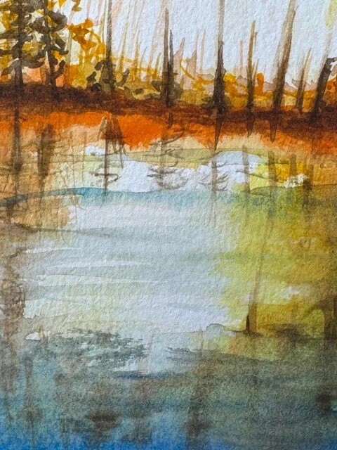 Reflection detail showing warm colors on the water