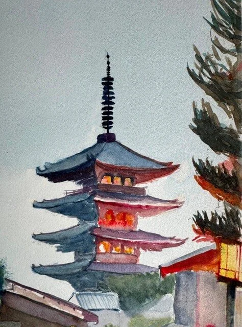 Close-up of glowing red Japanese pagoda tower with dark roof tiers against a soft sky