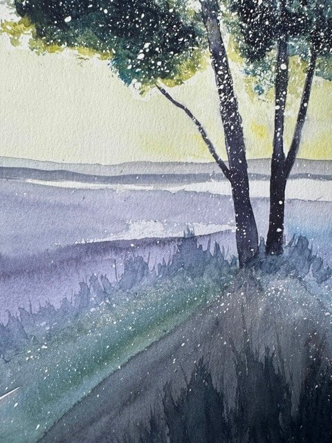 Grassy ground and shoreline with layered watercolor