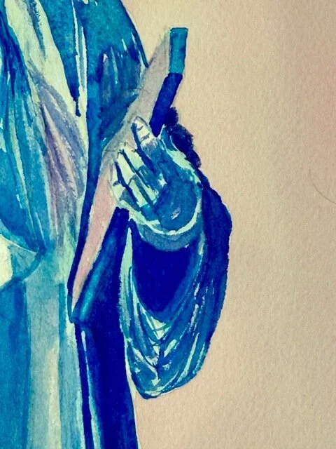 Detail of the Statue of Liberty's hand and draped sleeve holding the iconic tablet.