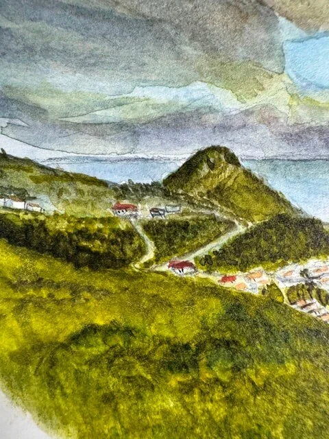 Close-up of left hills and winding road with scattered rooftops in green watercolor landscape