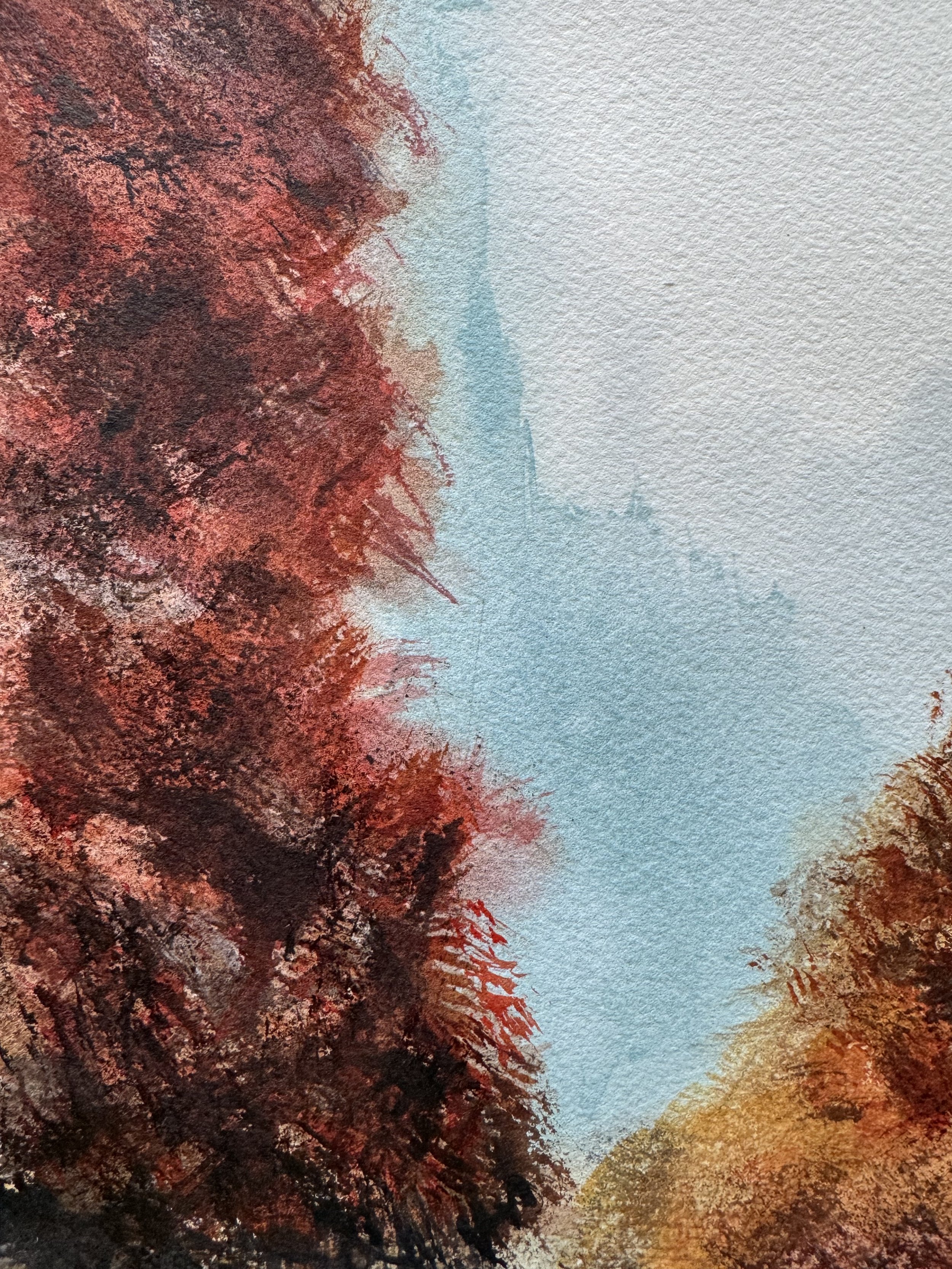 Soft mist and light blue sky between vibrant autumn trees in watercolor