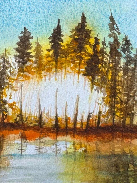 Close-up of evergreen trees and radiant sunburst in watercolor