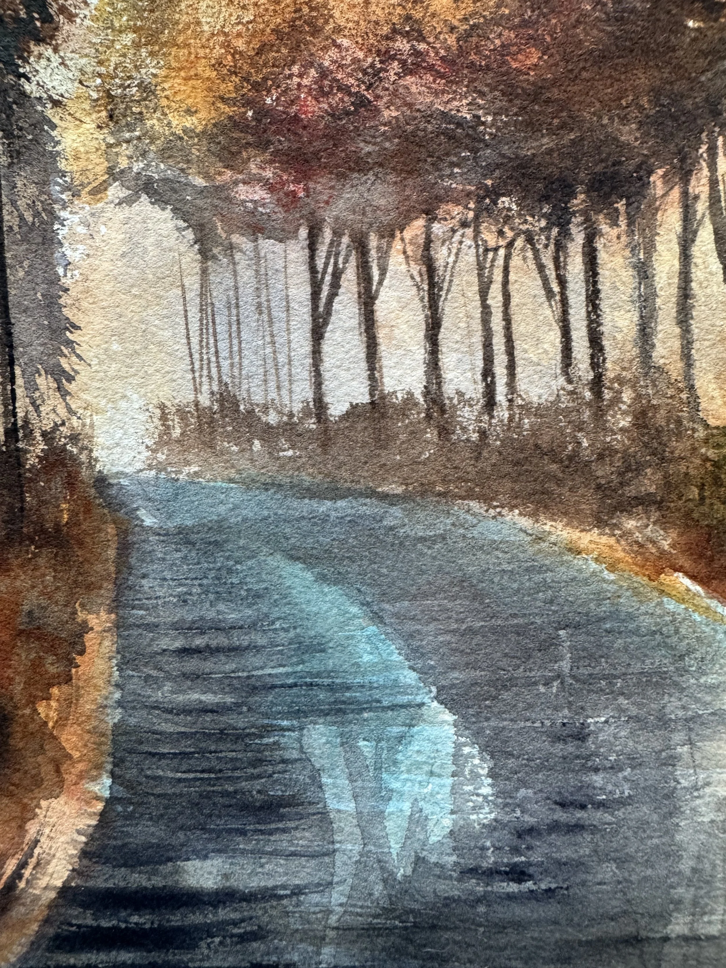 Curved forest road leading into a glowing horizon through a corridor of trees
