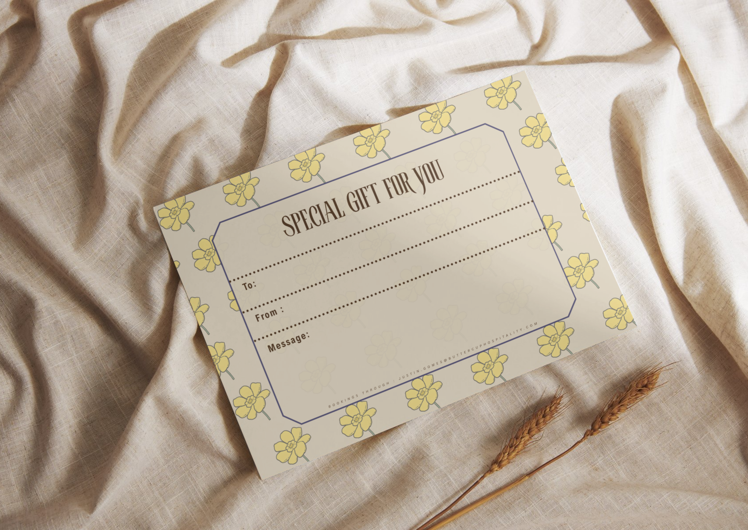 Buttercup gift certificate card on linen backdrop